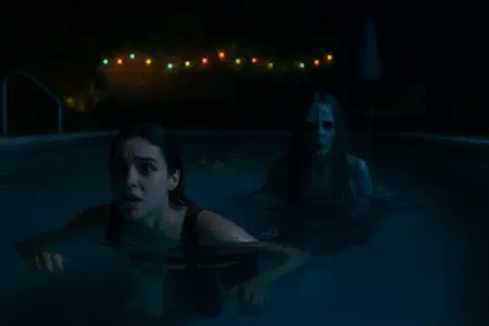 24freehd.com-Watch-the-latest-movie-Night-Swim.-While-swimming-a-ghost-suddenly-appears-in-the-pool